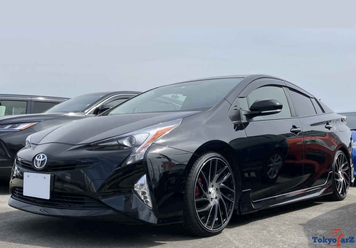Toyota Prius parked near tropical beach road in Sri Lanka